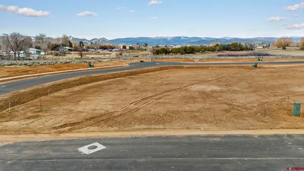 a view of an ocean and city