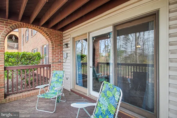 a view of a chair in wooden deck