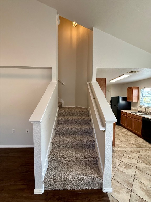 18304 Belfry Pass Manor, TX 78653 - Photo 18 of 26 Staircase with wood finished floors