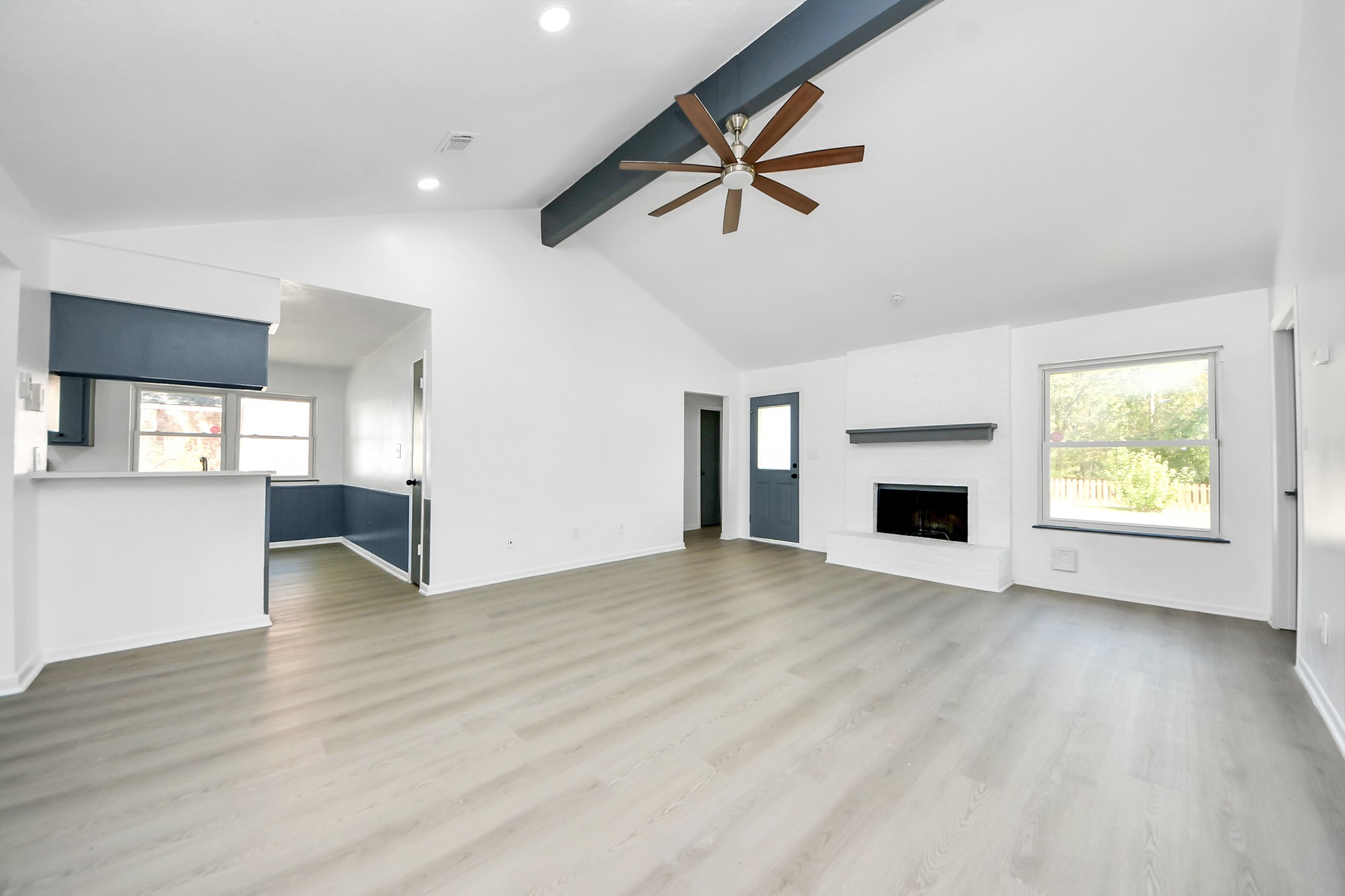 23002 Grand Rapids Lane Spring, TX 77373 - Photo 22 of 41 a view of empty room with wooden floor and fan