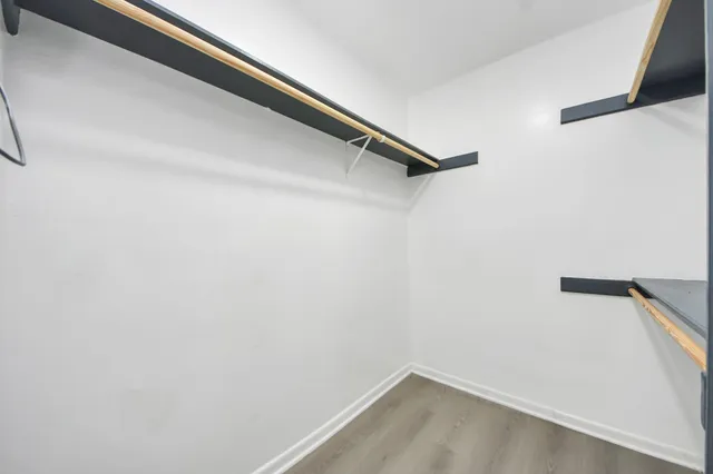 a view of a room with racks on the wall