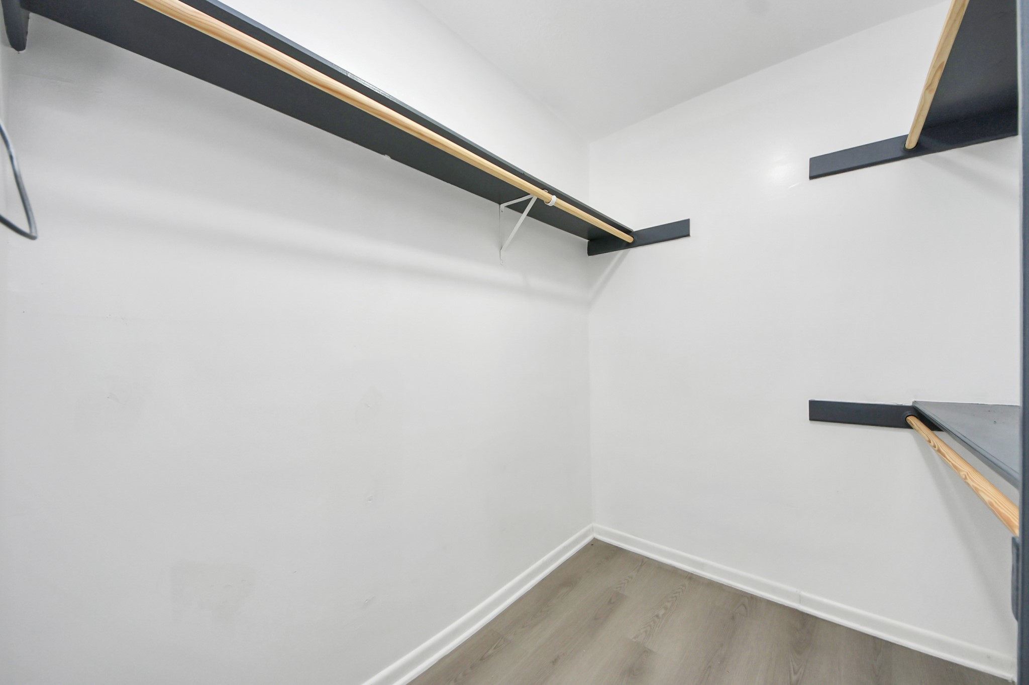 23002 Grand Rapids Lane Spring, TX 77373 - Photo 30 of 41 a view of a room with racks on the wall