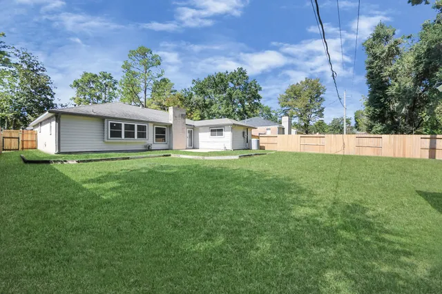 a house view with a garden space