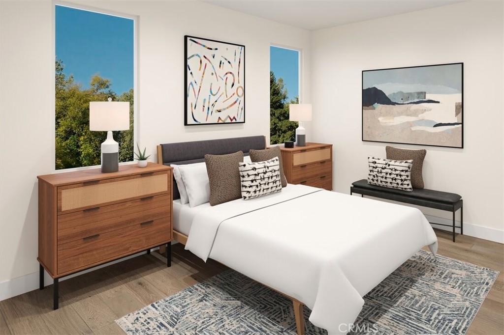 2067 West Pearl Street Encinitas, CA 92024 - Photo 4 of 8 a bedroom with a bed and painting on the wall