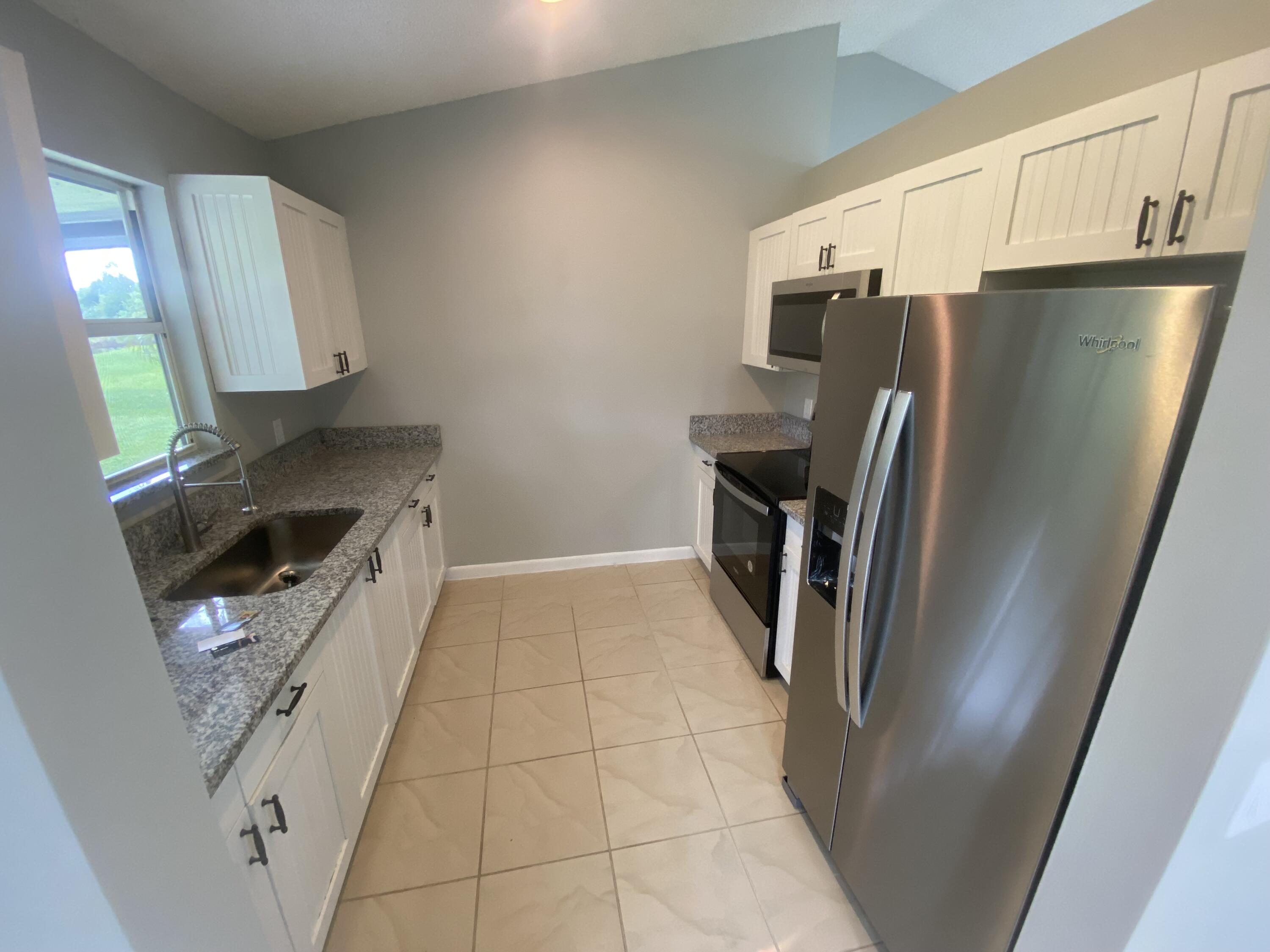 1450 Southwest Gilroy Road Port St. Lucie, FL 34953 - Photo 2 of 17 IMG_3591