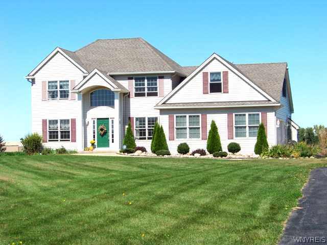 11624 Parker Road Marilla, NY 14052 - Photo 1 of 1 Exterior Front. Step into luxury in this 3000 sq.