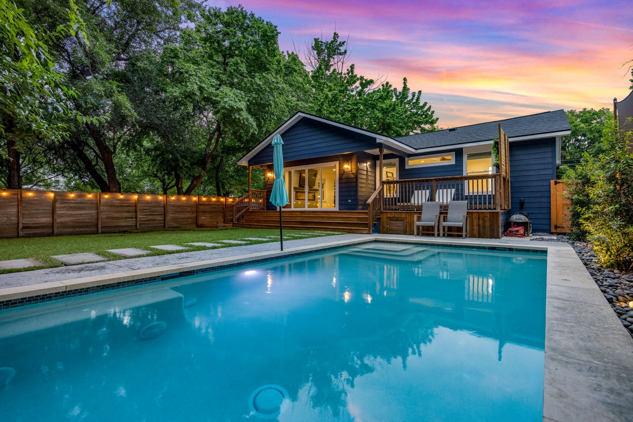 1515 Alguno Road Austin, TX 78757 - Photo 1 of 1 a front view of a house with garden