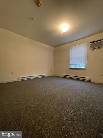 an empty room with an entryway