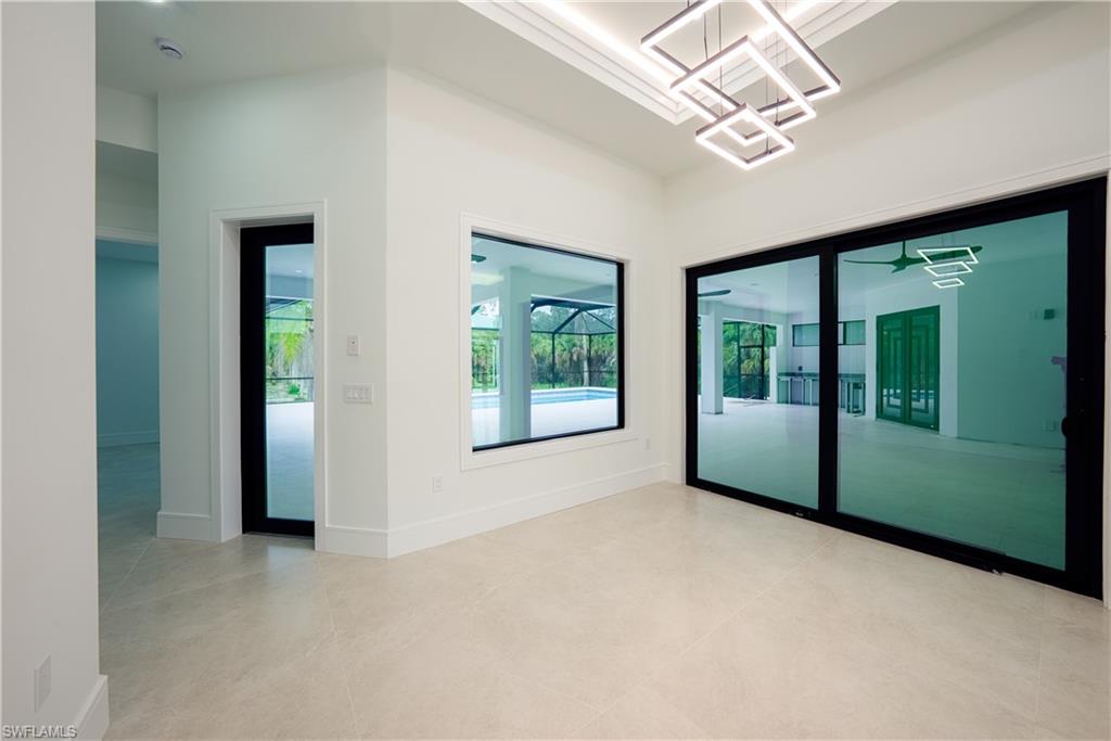 522 17th Street Southwest Naples, FL 34117 - Photo 27 of 48 a view of an empty room with a window