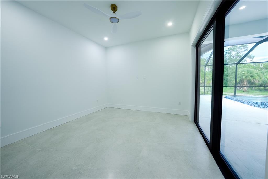 522 17th Street Southwest Naples, FL 34117 - Photo 30 of 48 an empty room with a window