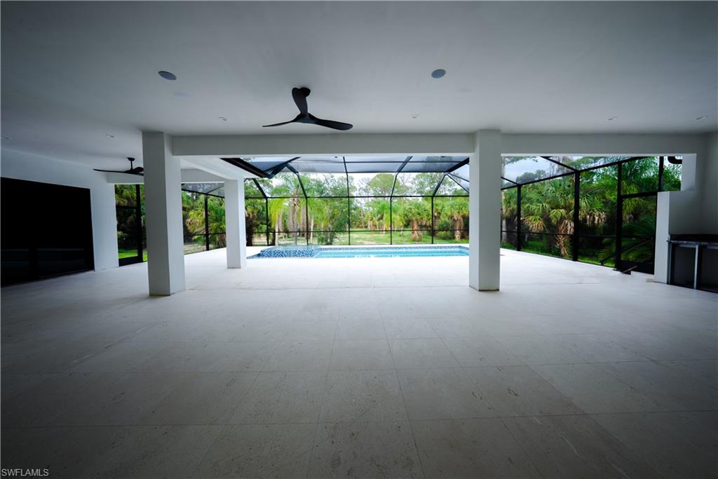522 17th Street Southwest Naples, FL 34117 - Photo 41 of 48 a view of an empty room with a large window