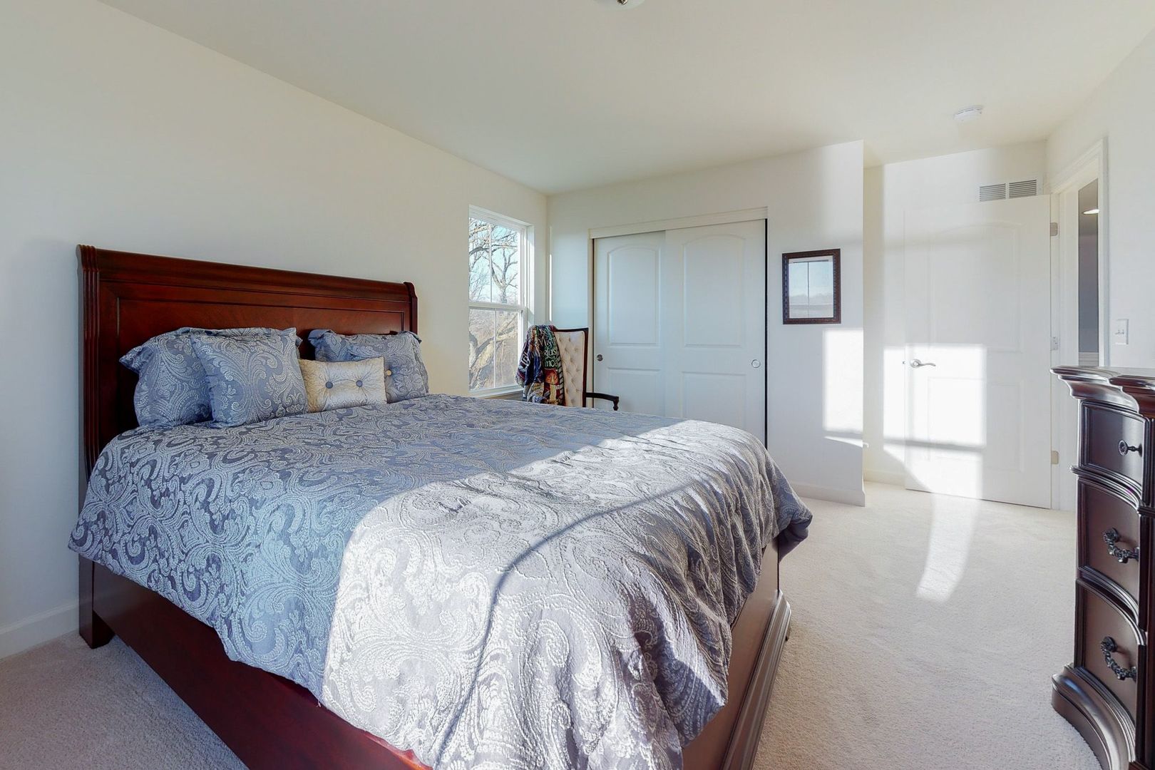 4362 Rudyard Kipling Road Elgin, IL 60124 - Photo 23 of 33 a bedroom with a bed and a window