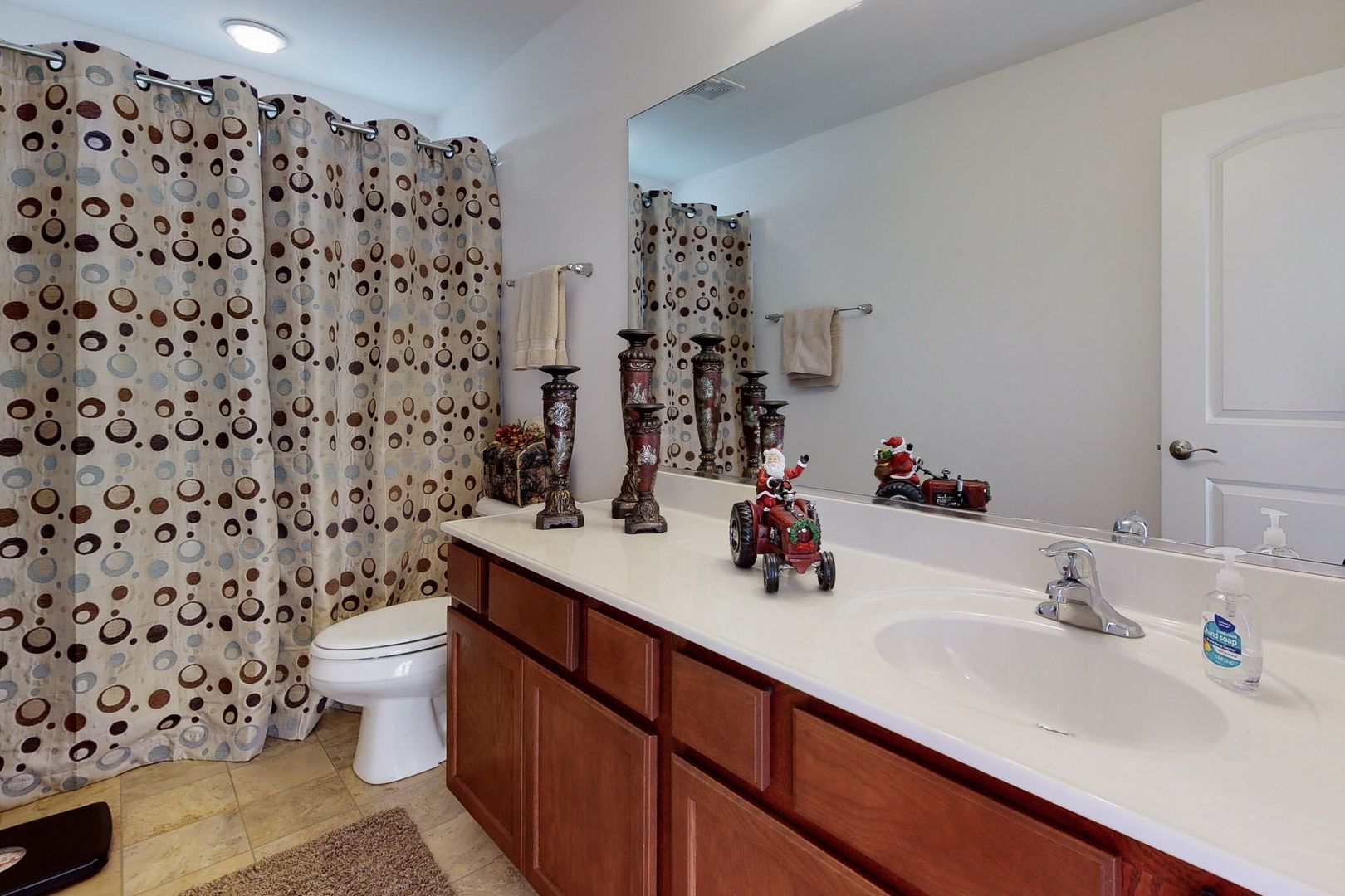 4362 Rudyard Kipling Road Elgin, IL 60124 - Photo 26 of 33 a bathroom with a sink toilet and shower