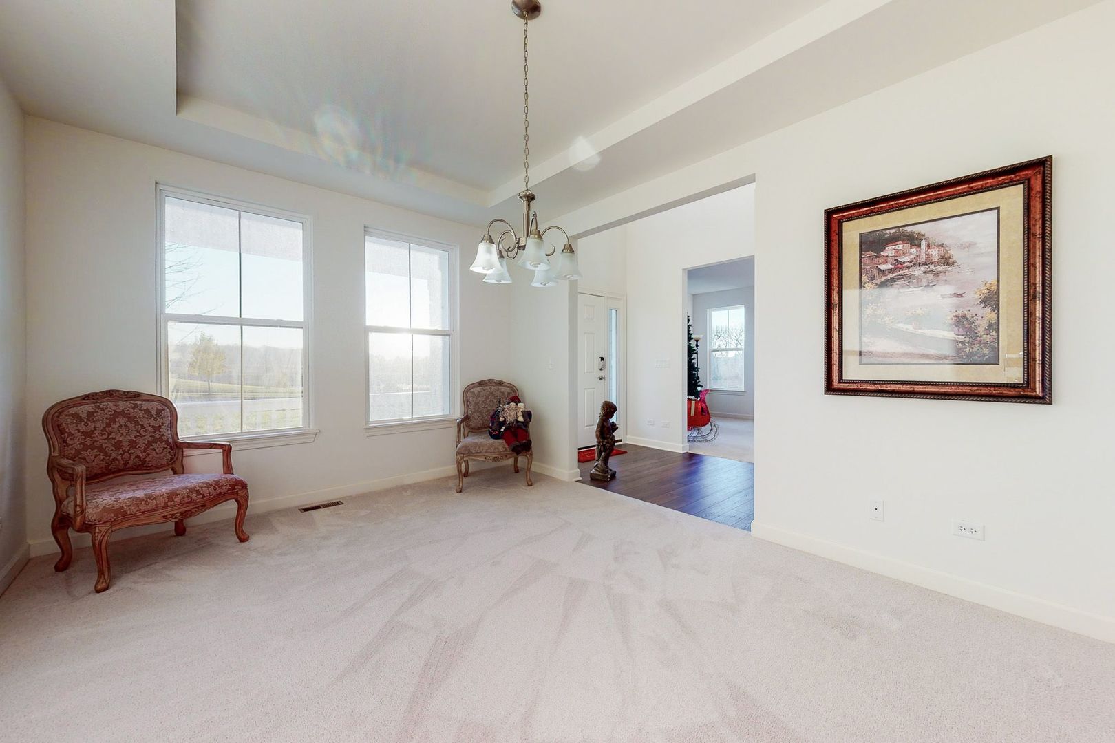 4362 Rudyard Kipling Road Elgin, IL 60124 - Photo 10 of 33 a living room with furniture and a large window