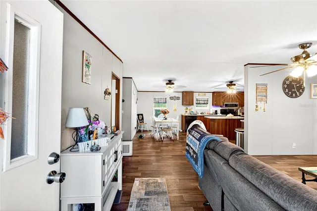 an aerial view of a house with a yard and garden