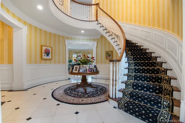a very nice looking dining room with a table and chairs