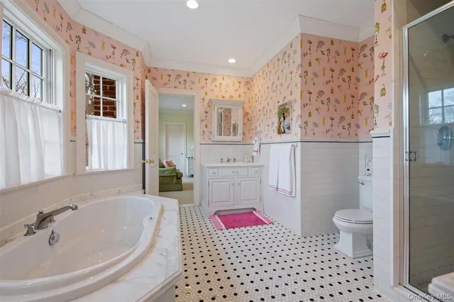 a bathroom with a sink and a shower