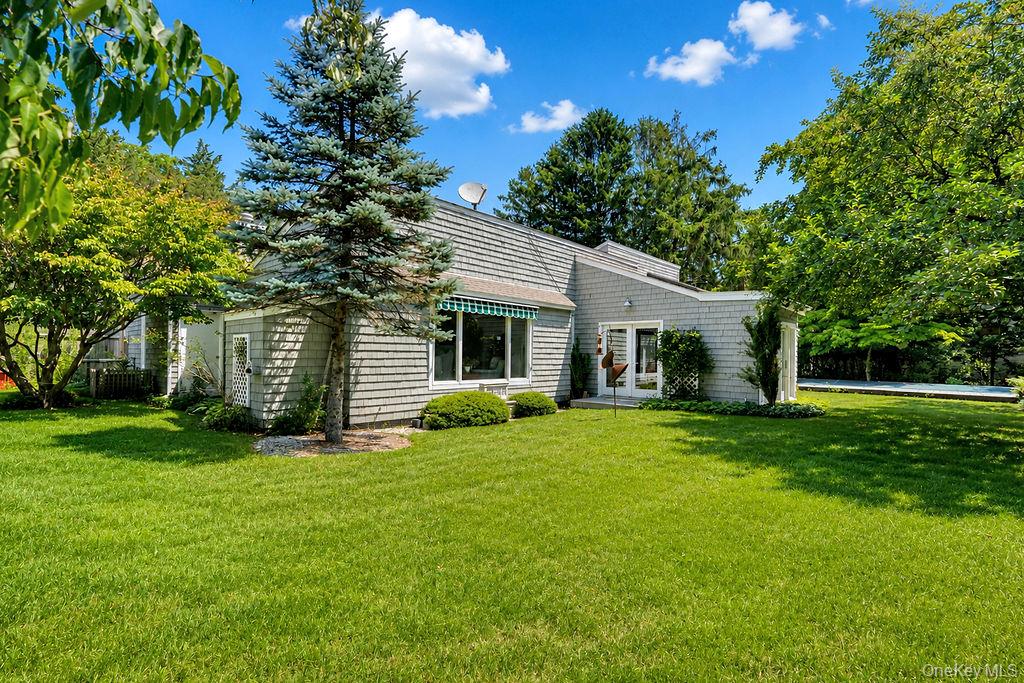 7 Tuthill Lane Remsenburg, NY 11960 - Photo 28 of 43 Home surrounded by mature landscaping