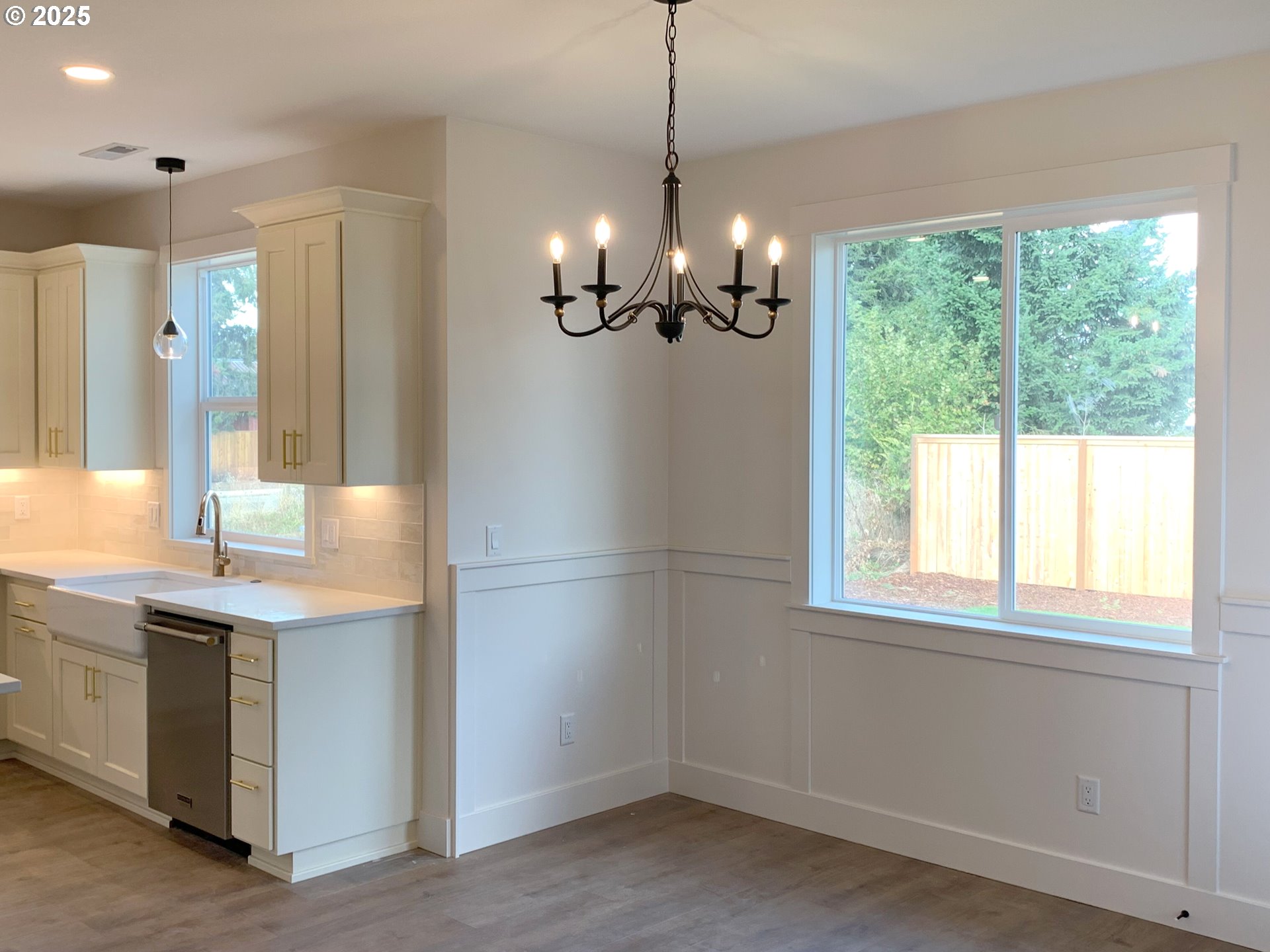 1896 South Holly Street Canby, OR 97013 - Photo 12 of 36 a bathroom with a sink a large mirror and a shower