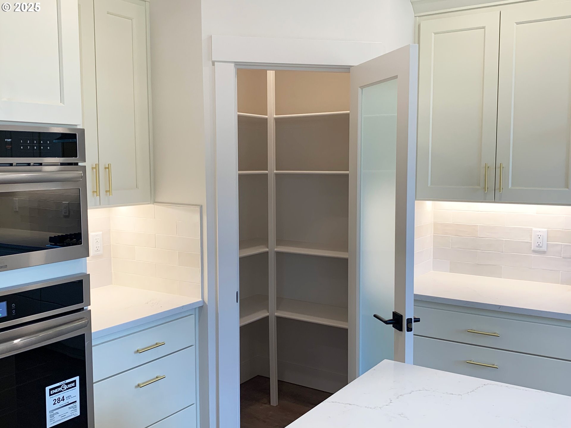 1896 South Holly Street Canby, OR 97013 - Photo 15 of 36 a view of walk in closet with empty racks
