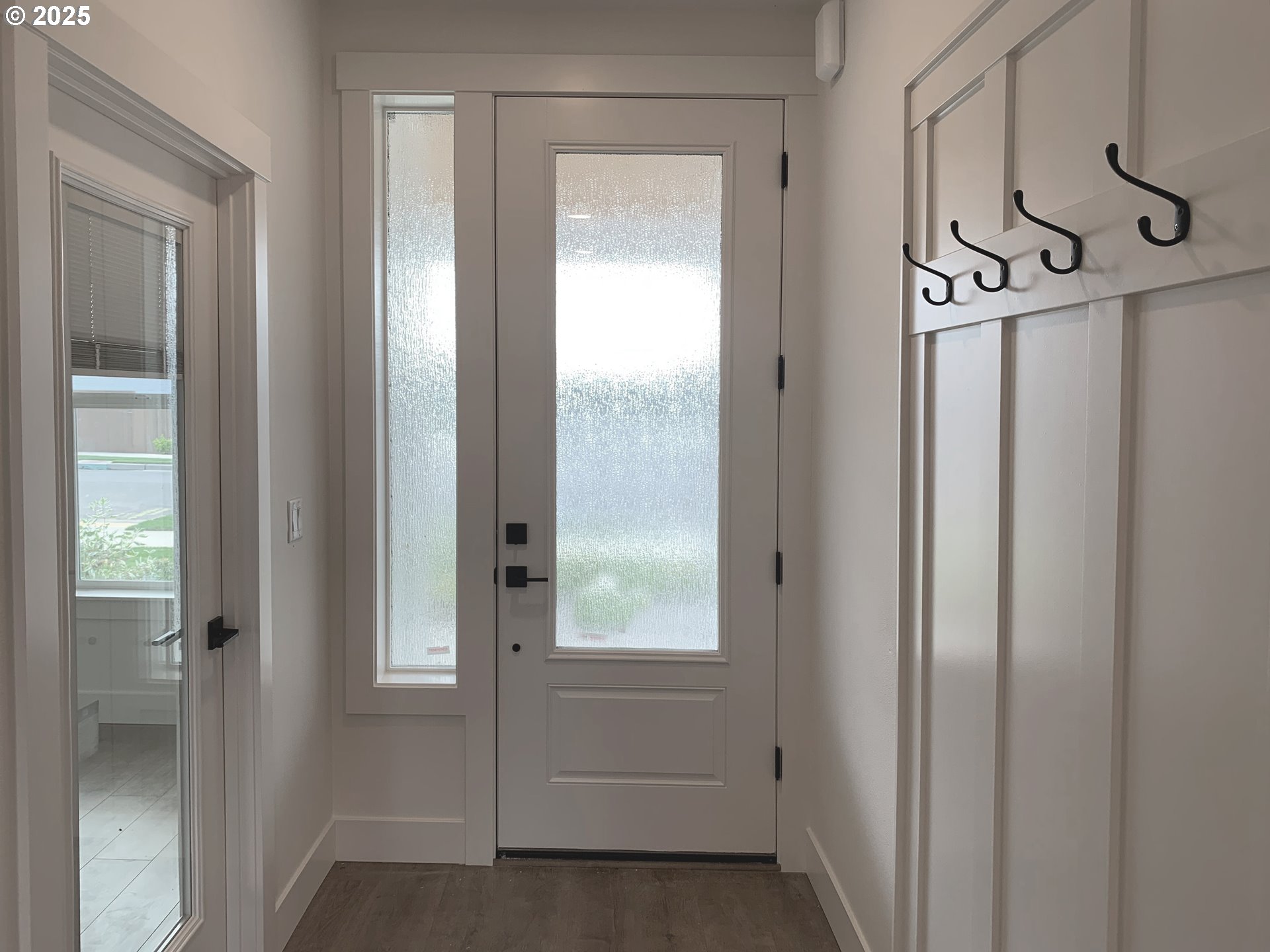 1896 South Holly Street Canby, OR 97013 - Photo 19 of 36 a view of an entryway with wooden floor