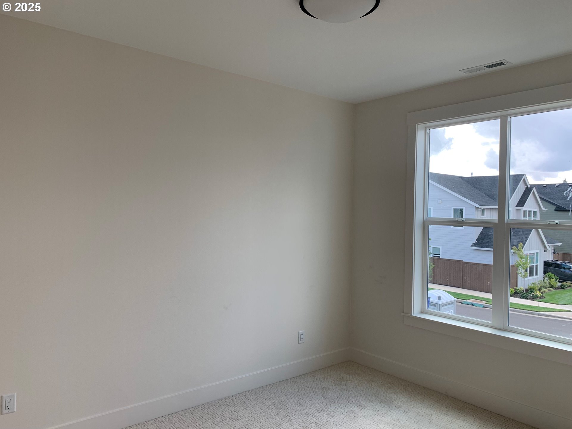 1896 South Holly Street Canby, OR 97013 - Photo 22 of 36 a view of an empty room with a window