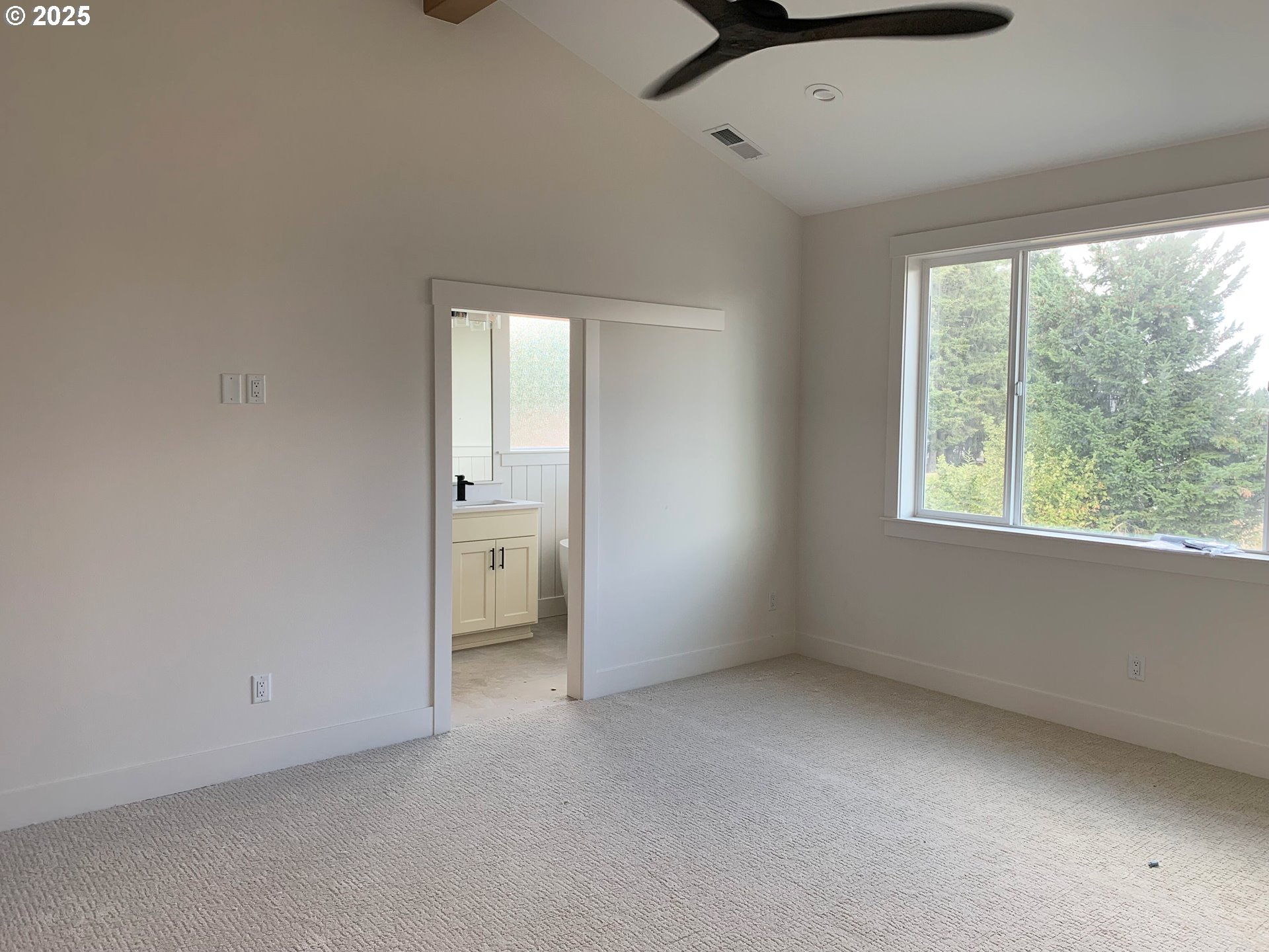 1896 South Holly Street Canby, OR 97013 - Photo 25 of 36 an empty room with a window and a ceiling fan