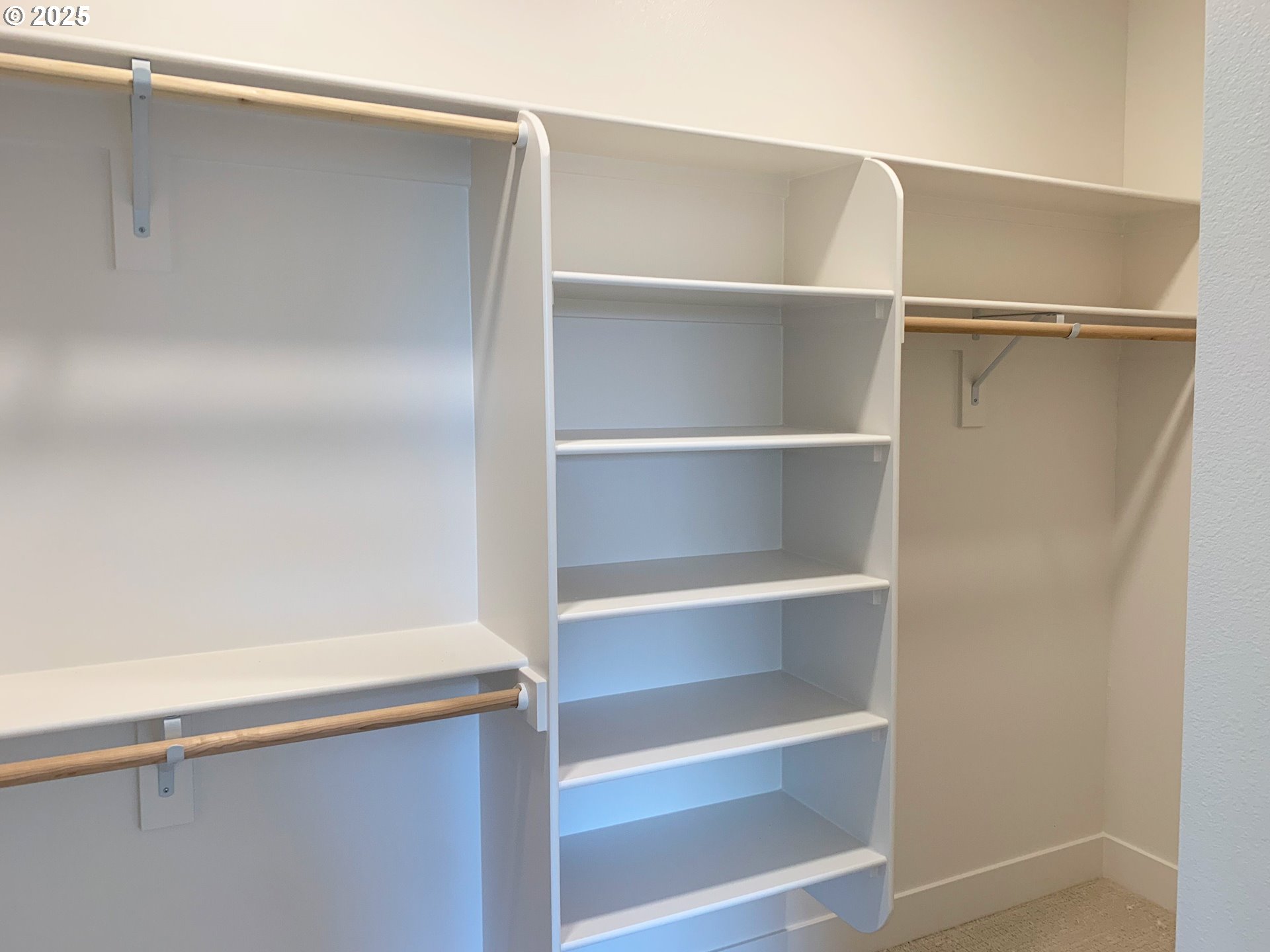 1896 South Holly Street Canby, OR 97013 - Photo 28 of 36 a view of an empty walk in closet