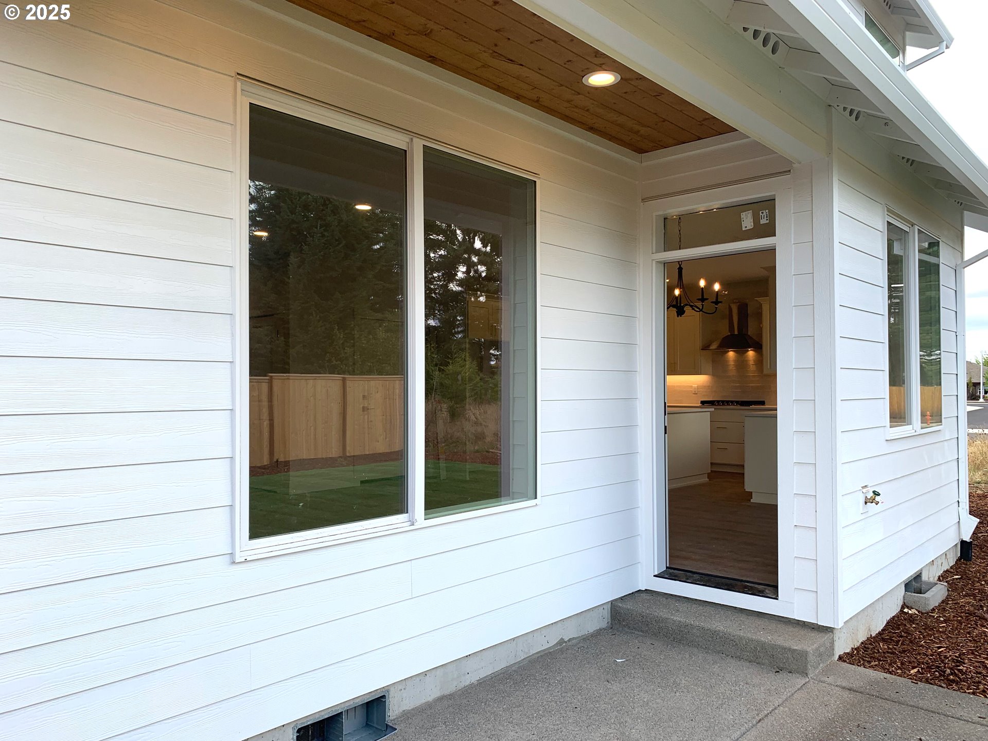 1896 South Holly Street Canby, OR 97013 - Photo 29 of 36 a view of front door and bedroom