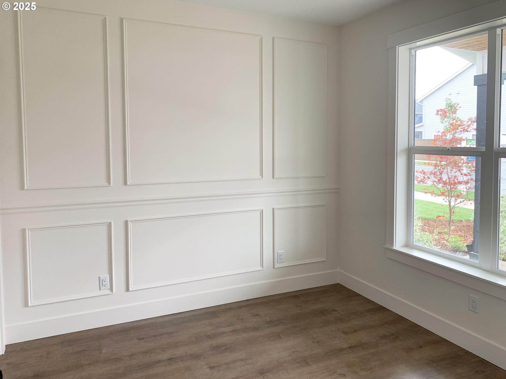 1896 South Holly Street Canby, OR 97013 - Photo 5 of 36 an empty room with wooden floor and windows