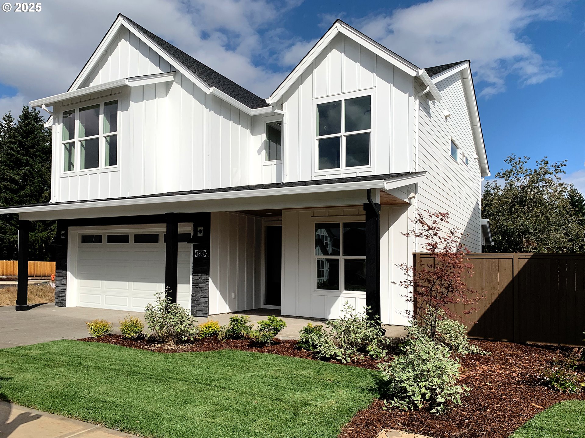 1896 South Holly Street Canby, OR 97013 - Photo 9 of 36 a front view of a house with a yard