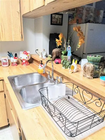 a view of a swimming pool with furniture