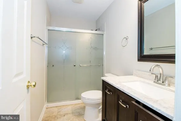 a view of a balcony with wooden floor
