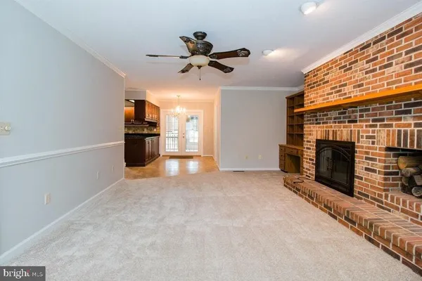 a spacious bathroom with a granite countertop tub sink and mirror