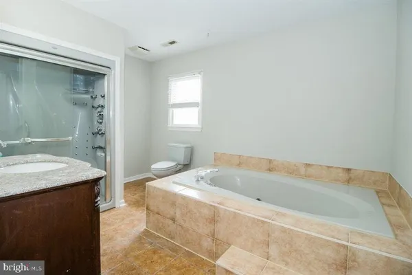 a view of a house with a garden