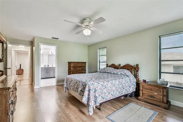 a bathroom with a sink a vanity and a mirror
