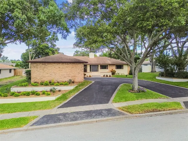 a front view of a house with a garage