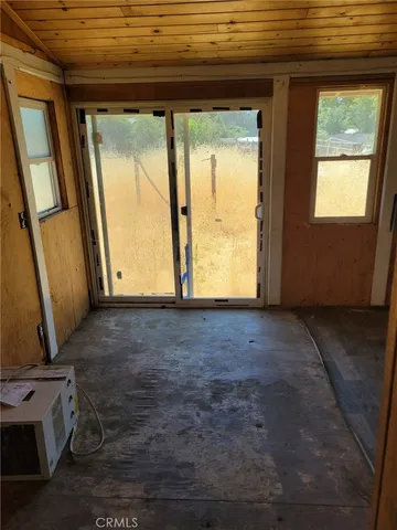 a view of empty room with front door