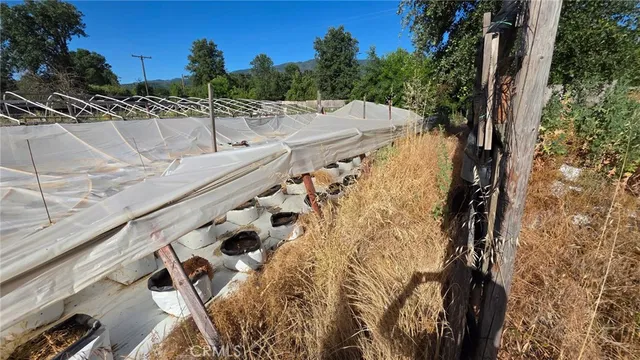 a view of balcony with furniture