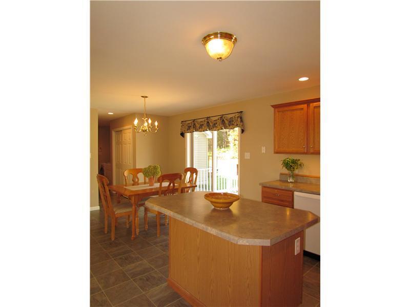 22 White Road Bowdoinham, ME 04008 - Photo 6 of 20 Dining Room. Large kitchen island is...