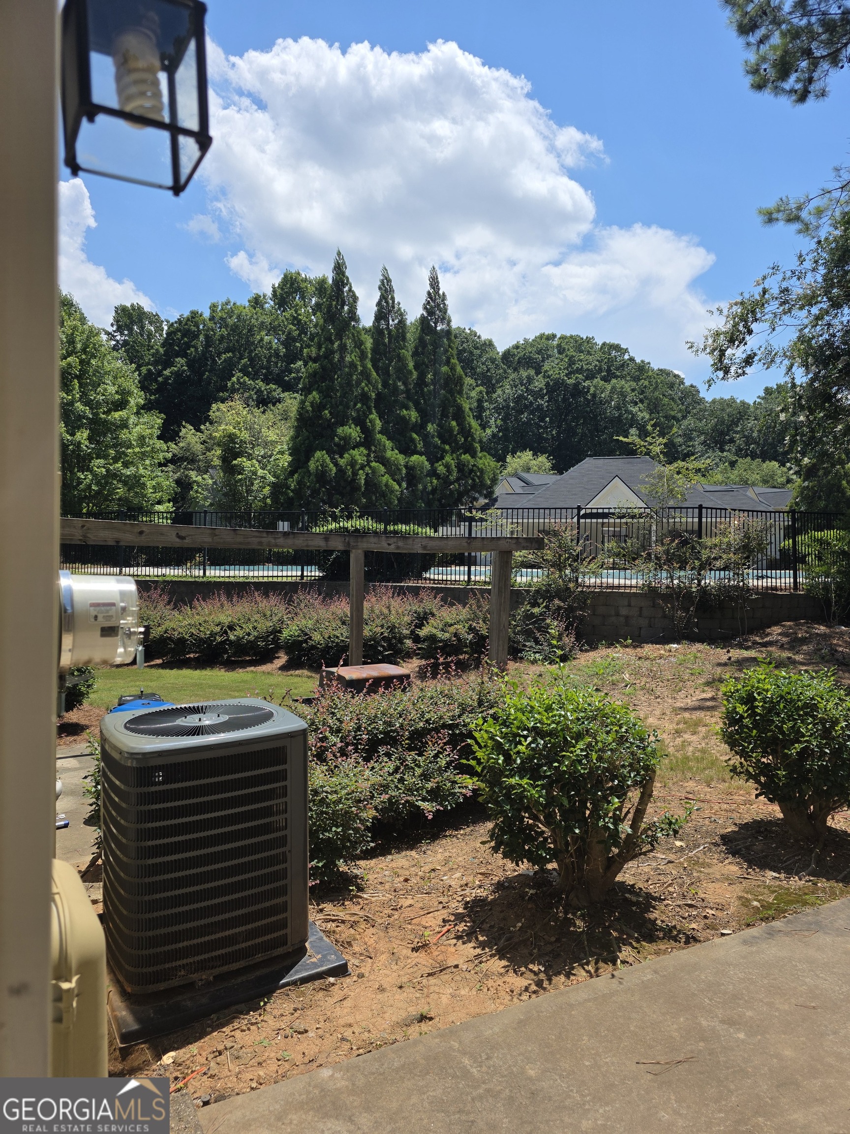 2873 Ridgeview Drive Atlanta, GA 30331 - Photo 13 of 32 a view of a backyard with plants and a patio