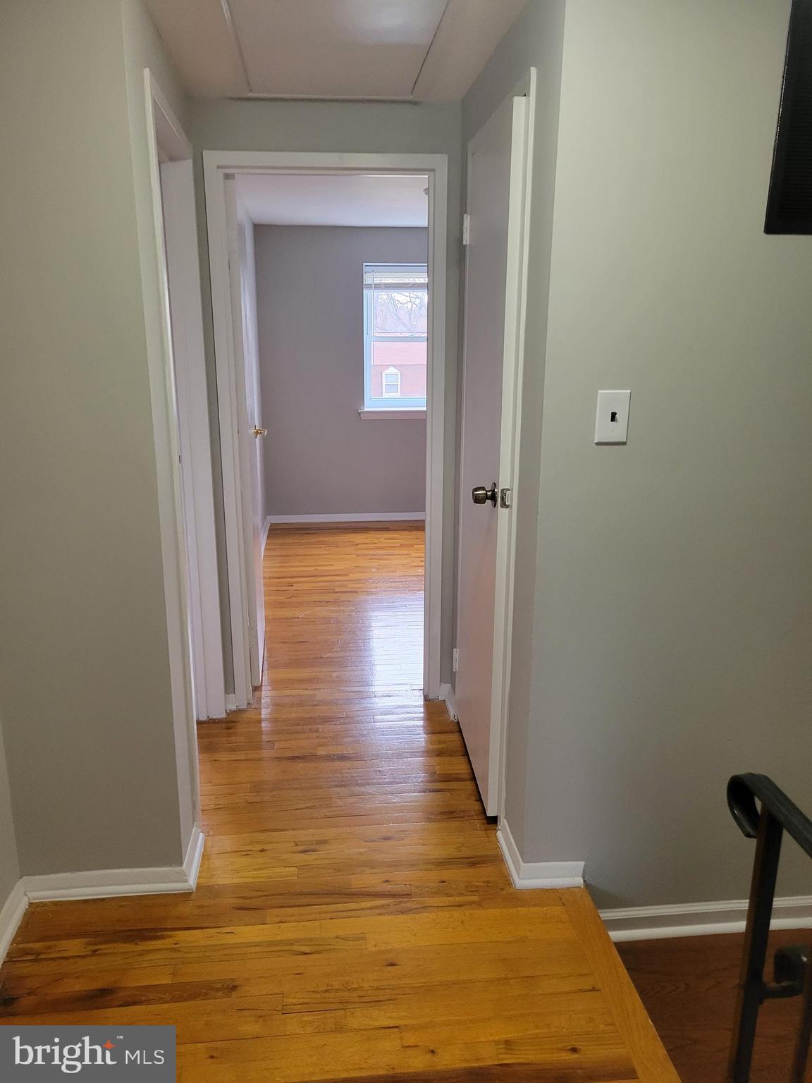 630 Kingston Road Baltimore, MD 21220 - Photo 16 of 34 a view of a hallway with wooden floor and closet