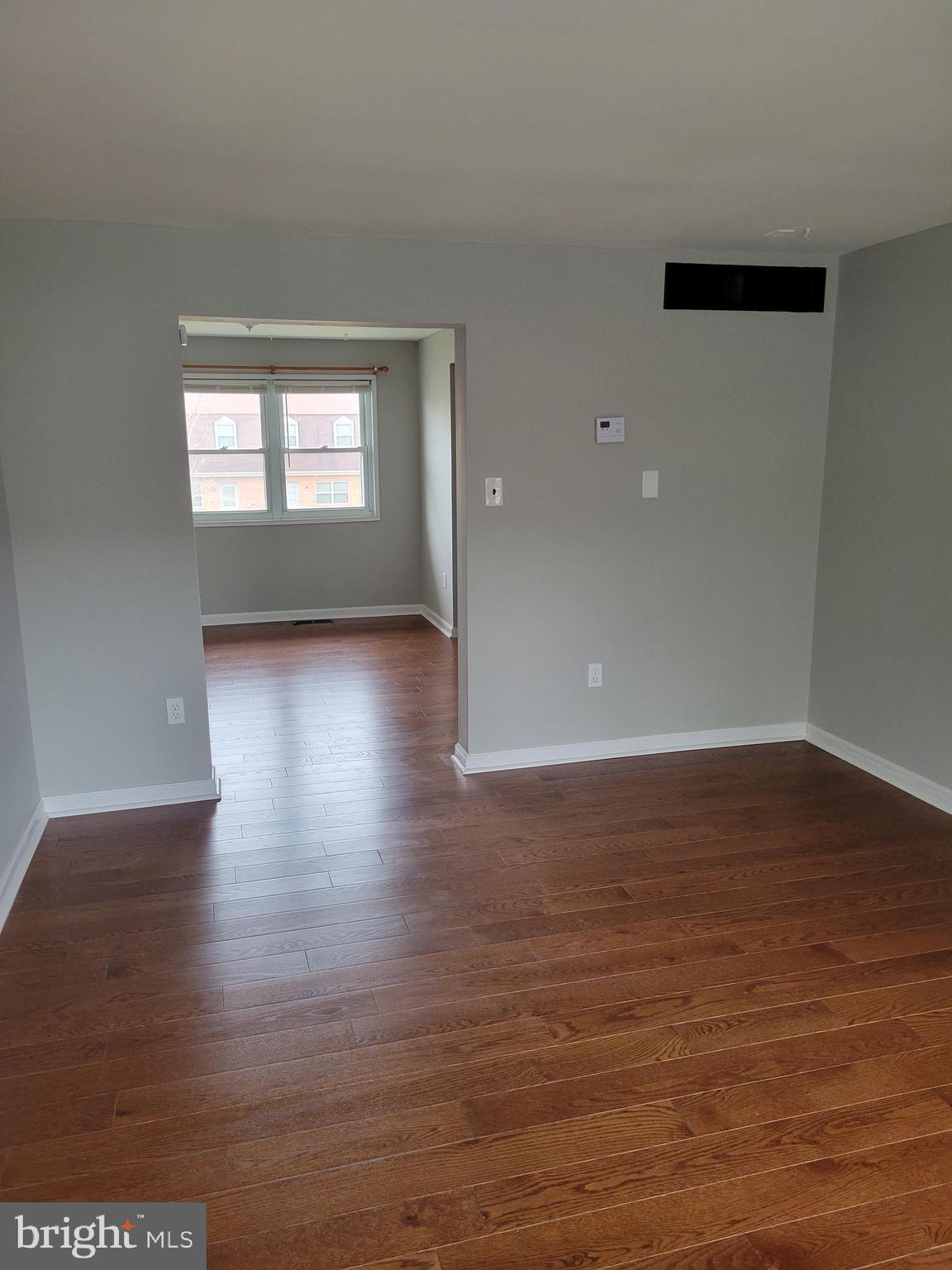 630 Kingston Road Baltimore, MD 21220 - Photo 3 of 34 a view of wooden floor and windows in a room