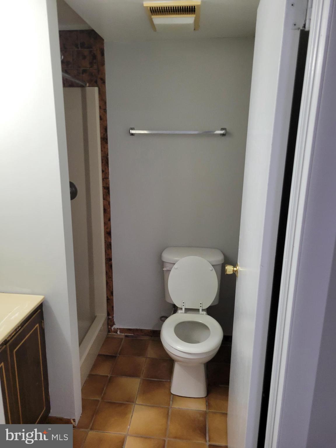 630 Kingston Road Baltimore, MD 21220 - Photo 31 of 34 a bathroom with a toilet