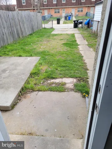 a view of a backyard with green space