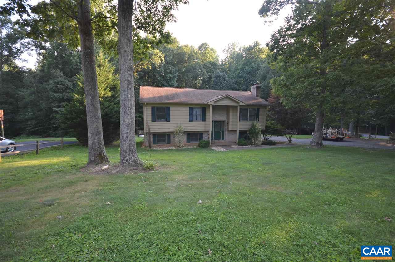 389 Morning Glory Road Ruckersville, VA 22968 - Photo 1 of 34 a view of an house with backyard space and balcony