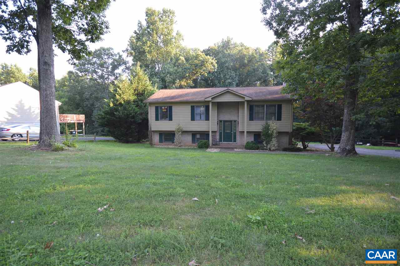389 Morning Glory Road Ruckersville, VA 22968 - Photo 13 of 34 a view of a house with a backyard