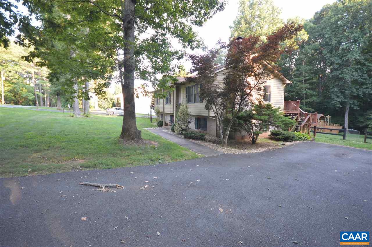 389 Morning Glory Road Ruckersville, VA 22968 - Photo 14 of 34 a view of a road with large trees