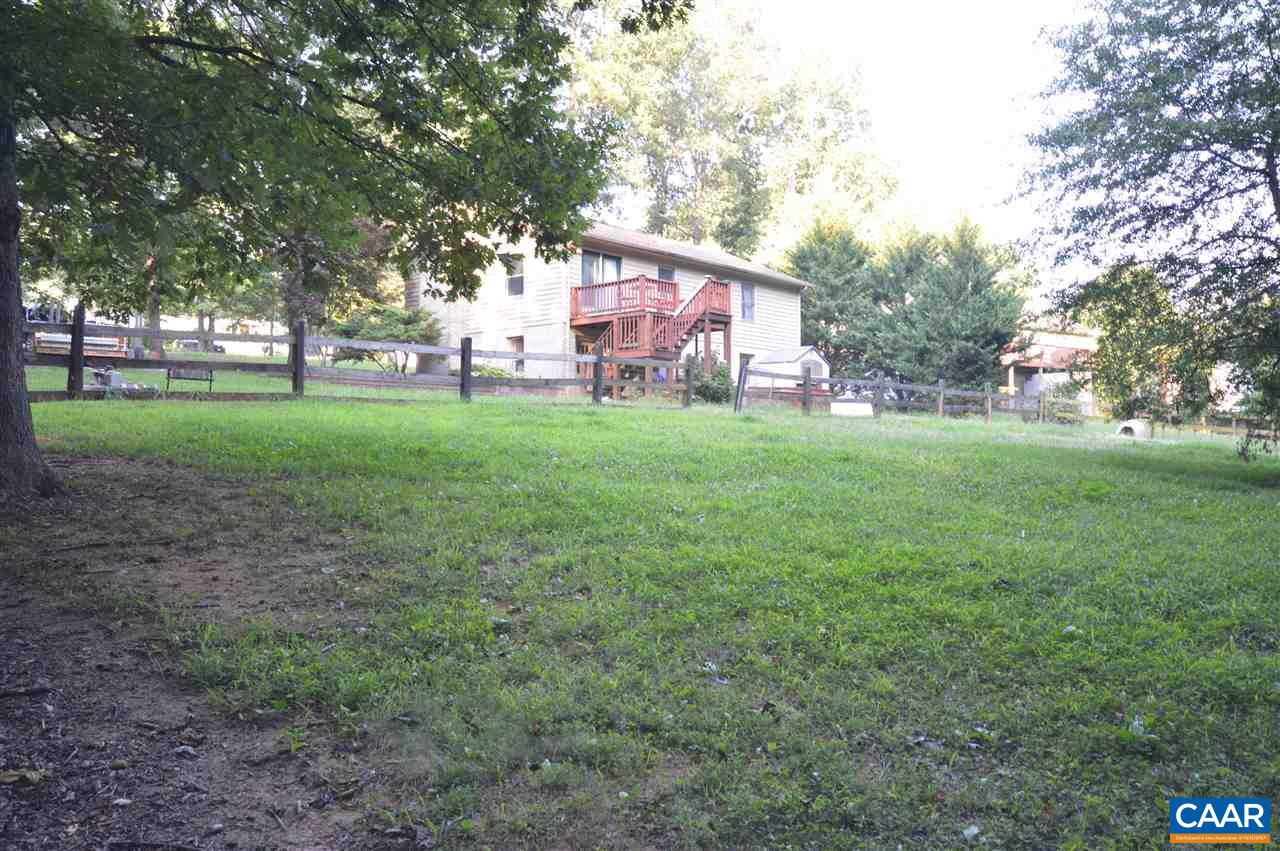389 Morning Glory Road Ruckersville, VA 22968 - Photo 15 of 34 a view of a big yard with a house