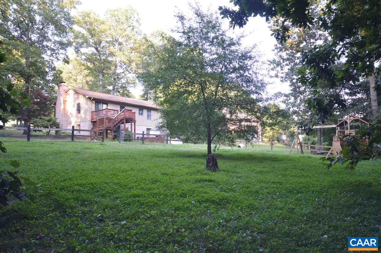 389 Morning Glory Road Ruckersville, VA 22968 - Photo 17 of 34 a view of an house with a tree